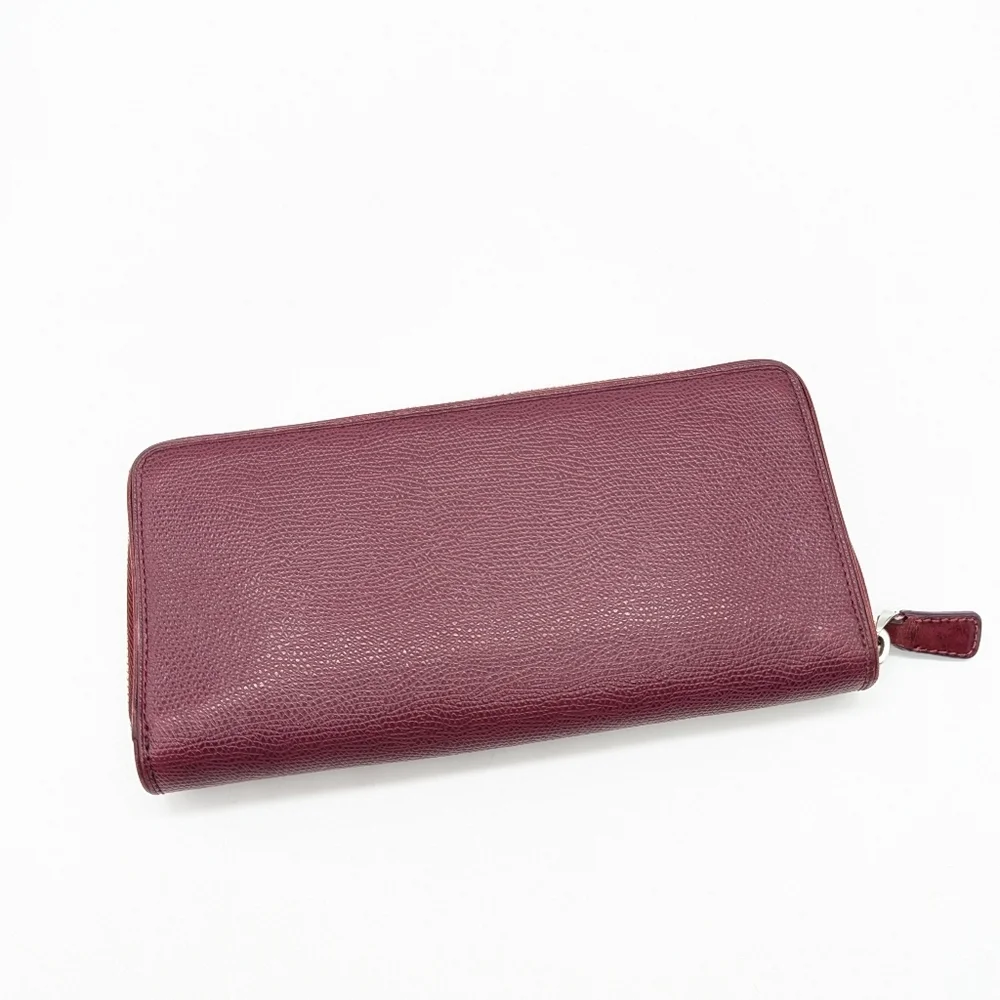 Tumi Plum Purple Leather Wallet
